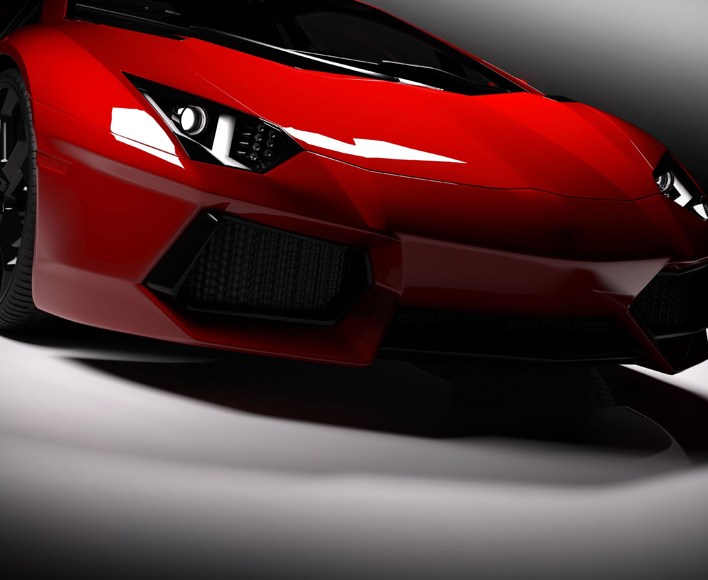The front of a red sports car
